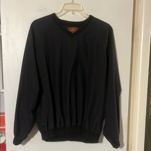 Restore black v-neck windbreaker. Fully lined. Front pockets.